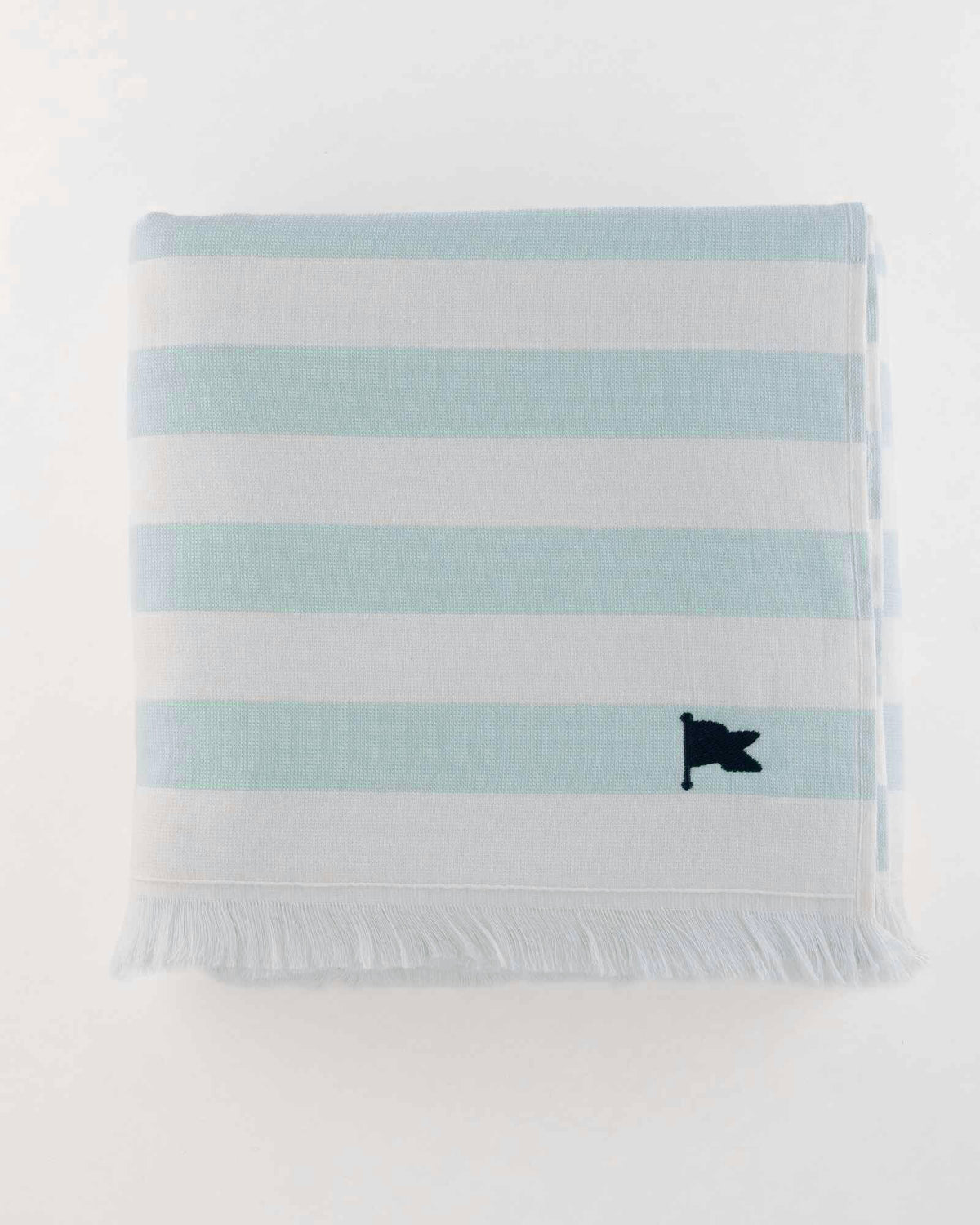 The Carlsbad Stripe Beach Towel in Canal Blue