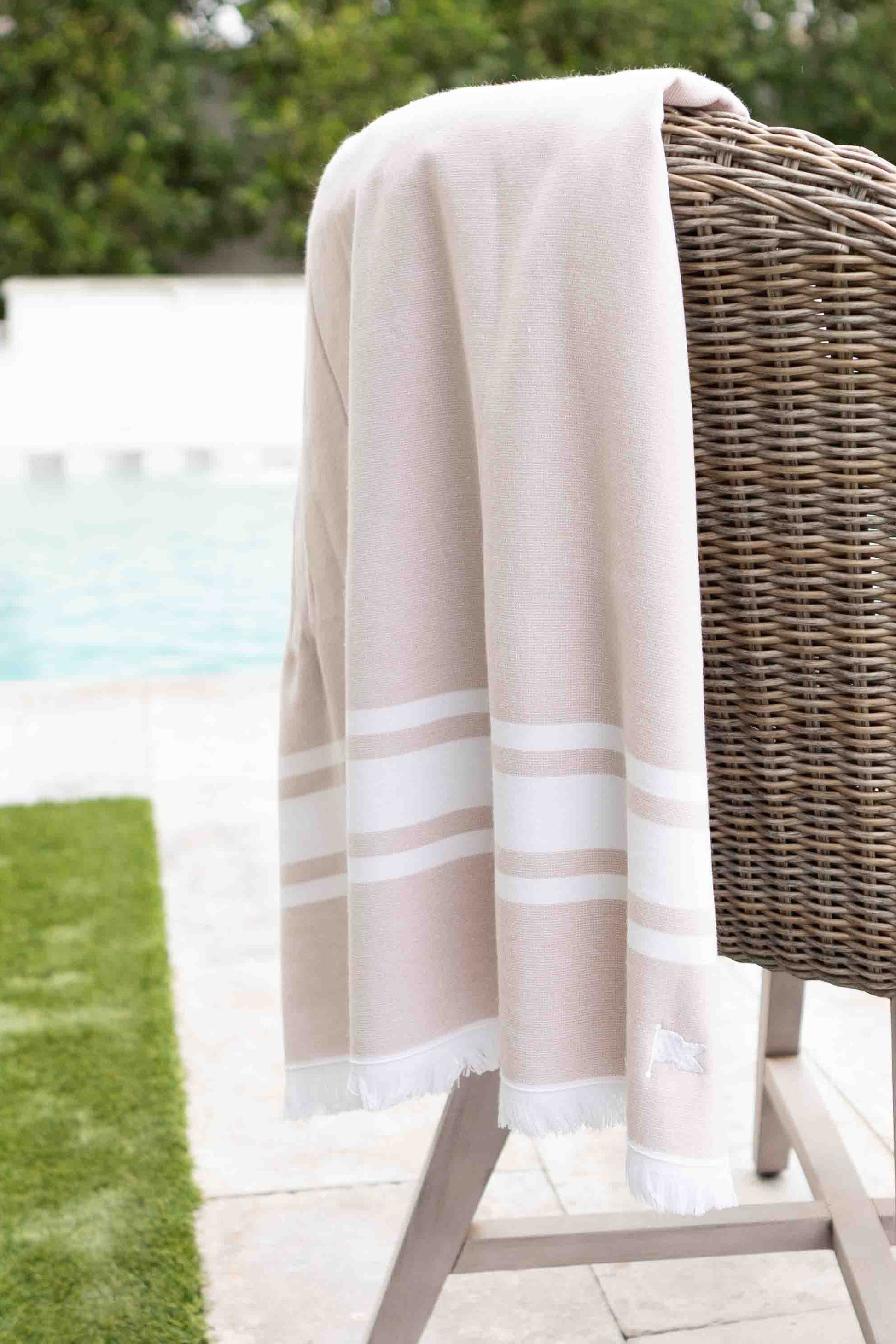 Tan luxery Turkish Peshteri beach Towel at home pool.