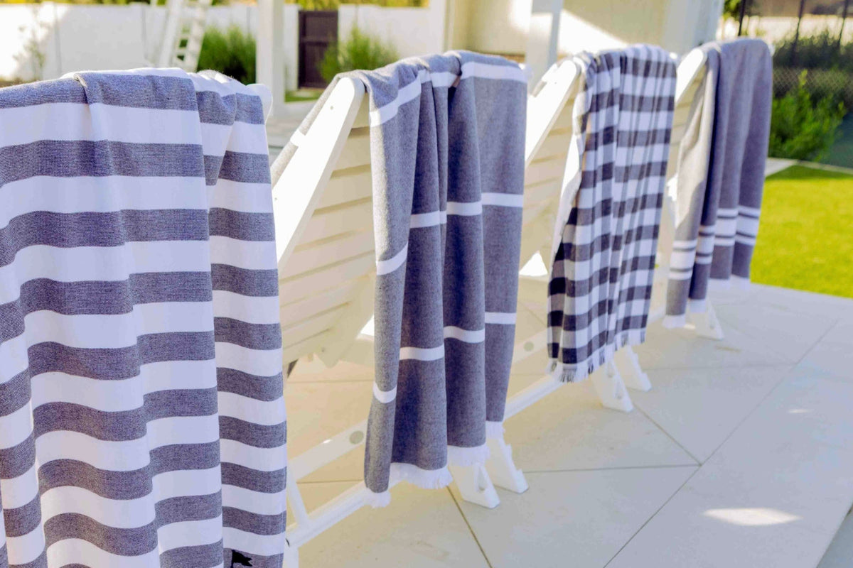 Black and white striped Turkish designer 
beach towels
