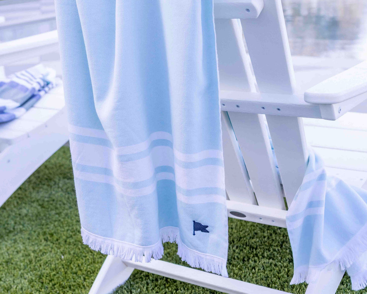 blue and white towel with triple stripe